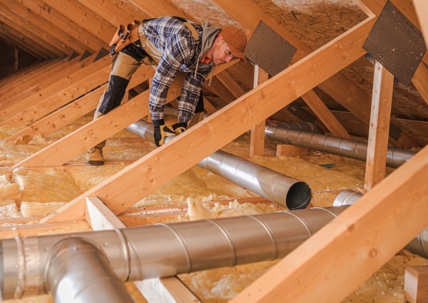 Frederick HVAC Services installing ducting in attic